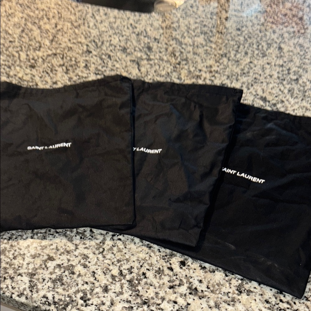 3 Saint Laurent dust bags 
15.5 “ x 11.5” 
Great condition